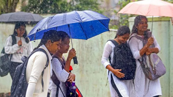 karnataka_rains_IMD_red_alert_Dharwad_schools_shut_1749703816801_1749703817128